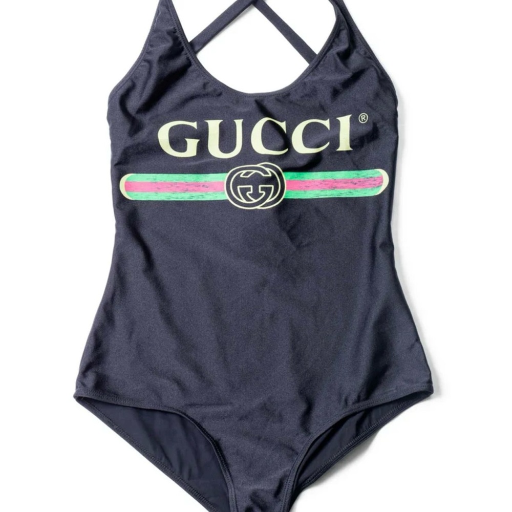 Gucci
Sparkling web-print halterneck swimsuit